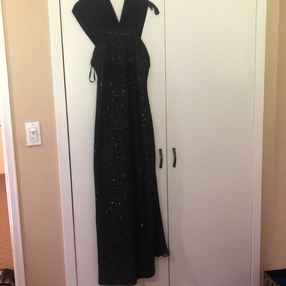 Black knit with mini sequins. Worn 1 time.